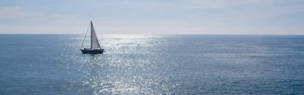 A sailing boat, yacht on a beutiful sunny day